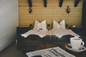 Tempat tidur dalam kamar di Hotel Bahnhof