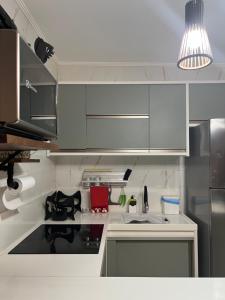 Η κουζίνα ή μικρή κουζίνα στο Nannai Residence - Apartamento Duplex +14 φωτογραφίες