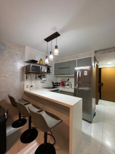 Η κουζίνα ή μικρή κουζίνα στο Nannai Residence - Apartamento Duplex
