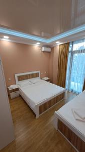 Katil atau katil-katil dalam bilik di Hotel Golden beach