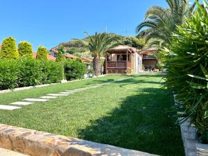 Vonkajšia záhrada v ubytovaní Palma Beach House
