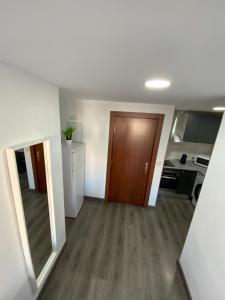 Kuchyňa alebo kuchynka v ubytovaní HEROE APARTAMENTO