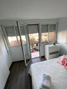 Posteľ alebo postele v izbe v ubytovaní HEROE APARTAMENTO