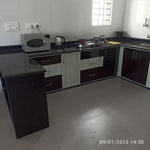 Η κουζίνα ή μικρή κουζίνα στο Henry's Home