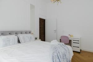 Postel nebo postele na pokoji v ubytování Woronicza - Margo Apart