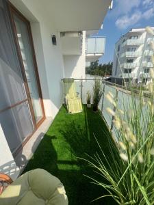 Vonkajšia záhrada v ubytovaní Apartament No. 26 Nad Iławką