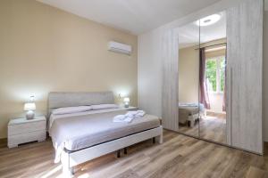 Posteľ alebo postele v izbe v ubytovaní Vico Rooms
