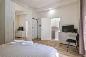 Posteľ alebo postele v izbe v ubytovaní Vico Rooms
