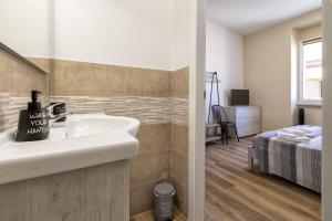 Posteľ alebo postele v izbe v ubytovaní Vico Rooms