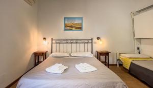 A bed or beds in a room at Agriturismo Al Girasole