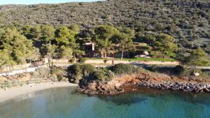 an aerial view of a house on a beach at Endless Seaview in Porto Rafti