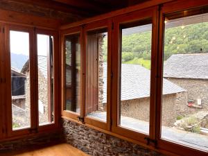 a room with windows with a view at Casa L'Isard - Anàs 