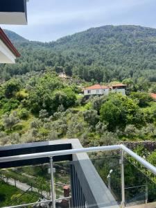 a view from the balcony of a house at Villa DIEMEN in Uzumlu
