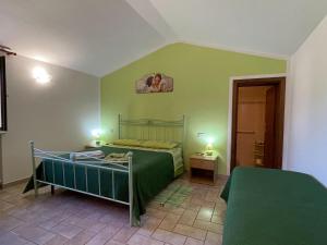 Posteľ alebo postele v izbe v ubytovaní Rustic holiday home in Assisi with swimming pool