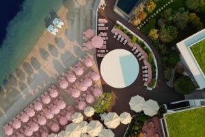 an overhead view of a group of pink buildings at Cap d'Antibes Beach Hotel in Juan-les-Pins