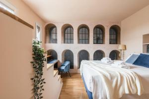 Posteľ alebo postele v izbe v ubytovaní The Best Rent - Spacious apartment with terraces with panoramic view of Rome