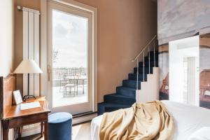 Posteľ alebo postele v izbe v ubytovaní The Best Rent - Spacious apartment with terraces with panoramic view of Rome