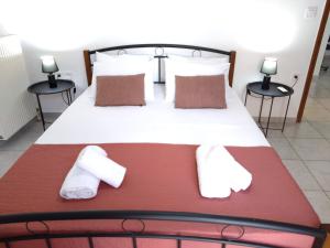 Кровать или кровати в номере Chania Locals Flat