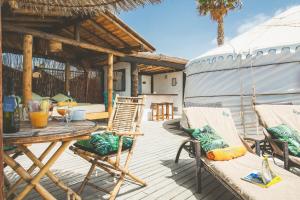 Patio nebo venkovní prostory v ubytování Finca De Arrieta Village - Yurts and Stone Cottages - Shared Pool - Walking distance to Arrieta Beach - Off Grid