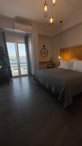 Postel nebo postele na pokoji v ubytování DIIO Suites