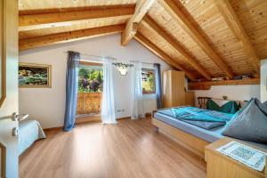 Postel nebo postele na pokoji v ubytování Ferienhof Turmwirt Pink Leidy + 25 fotografií