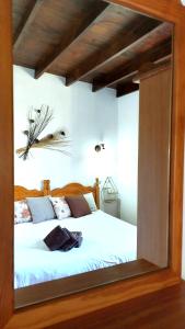 Łóżko lub łóżka w pokoju w obiekcie Casa Nisamarita by Sea You There Fuerteventura