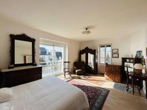 En eller flere senge i et værelse på La villa Marguerite, face mer avec terrasses