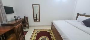 Imagine din galeria proprietății Downtown Virgins Hotel în Elmina +27 fotografii