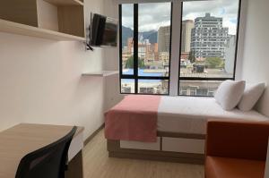 TV a/nebo společenská místnost v ubytování Apartahotel Connect Bogotá