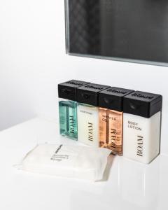 a stack of books sitting on top of a table at Tranquil River Home in Asheville