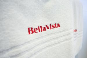 a white shirt with the word bella vita on it at Hotel Bellavista Locarno in Locarno