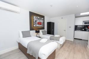 Kuchyň nebo kuchyňský kout v ubytování W6 Hotel