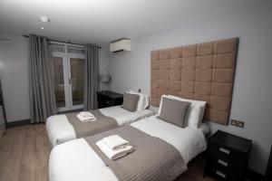 Postel nebo postele na pokoji v ubytování W6 Hotel
