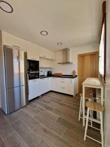 Kuchyň nebo kuchyňský kout v ubytování Casa Rural Villa Cárcavas