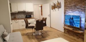 Kuchyň nebo kuchyňský kout v ubytování Apartment d ´Freizeit