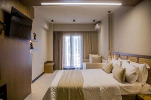TV a/nebo společenská místnost v ubytování Kasta Beach Hotel