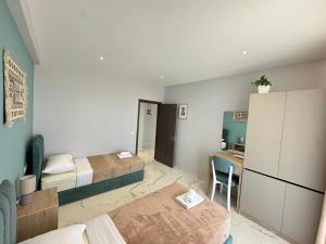 Ein Bett oder Betten in einem Zimmer der Unterkunft TreA Accomodations - Despacito Deluxe Sea View