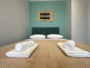 Ein Bett oder Betten in einem Zimmer der Unterkunft TreA Accomodations - Despacito Deluxe Sea View