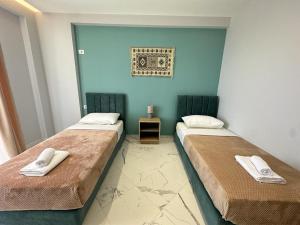 Ein Bett oder Betten in einem Zimmer der Unterkunft TreA Accomodations - Despacito Deluxe Sea View