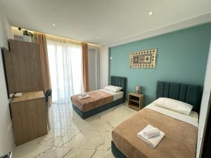 Ein Bett oder Betten in einem Zimmer der Unterkunft TreA Accomodations - Despacito Deluxe Sea View
