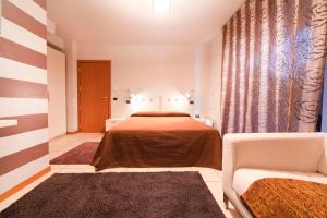 Postel nebo postele na pokoji v ubytování Agorà Hotel