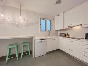 Küche/Küchenzeile in der Unterkunft Stay U-nique Apartments Roger Llúria