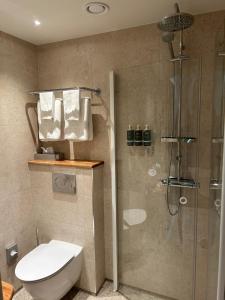 Koupelna v ubytování Sockerslottet Hotell