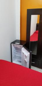 Tempat tidur dalam kamar di REGIOTITLAN-PARQUE FUNDIDORA