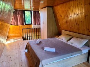 Voodi või voodid majutusasutuse Diamond Cottages toas