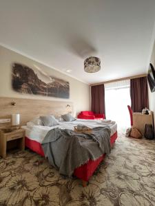 Posteľ alebo postele v izbe v ubytovaní Hotel Nosal Ski & Wine