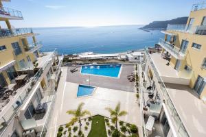 A view of the pool at Janelas de Zimbra - Lovely Apartment with Pool and Sea View or nearby