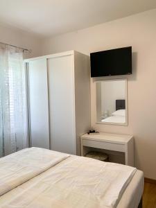 Postel nebo postele na pokoji v ubytování Haus Lupić
