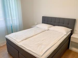 Postel nebo postele na pokoji v ubytování Haus Lupić