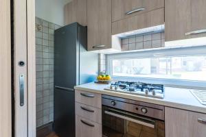 Kuchyň nebo kuchyňský kout v ubytování Le Castagne Apartments Ischia